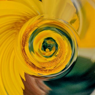 Abstract sunflower Abstract swirl of yellow and green hues, resembling a floral pattern.